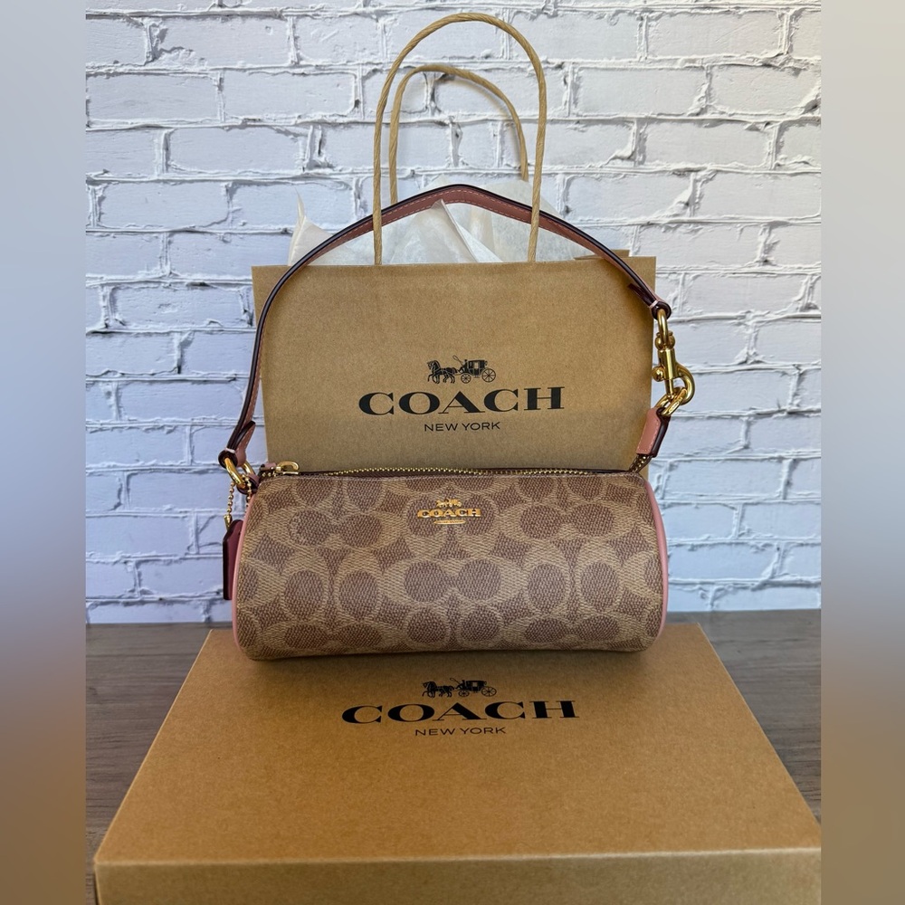 Last one new without price tag. Boxed gift set Coach Nolita Barrel Bag.